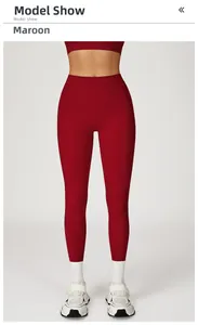 Detailed view of high-waisted dark red yoga leggings with athletic socks and sneakers