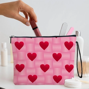 Pink heart print cosmetic bag with checkered texture and zipper closure for makeup storage