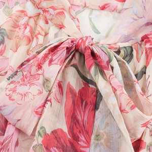 Pink floral chiffon dress featuring a sweet bow neckline and light fabric texture