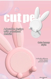 Close-up of pink rabbit desk phone stand showing the adjustable alloy rod and silicone pad