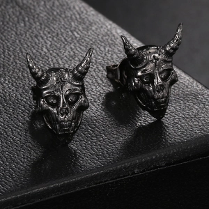 Gothic punk skull stud earrings in glossy black finish for a vintage streetwear look