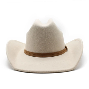 Detailed view of wide brim beige wool felt cowboy hat with classic brown leather band