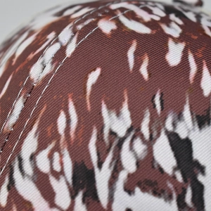 Macro shot of durable leopard pattern fabric with high-quality reinforced stitching