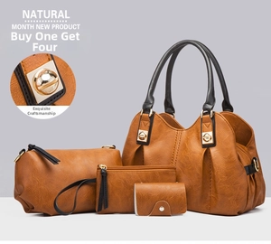 Detailed set of 4 brown embossed leather bags including tote and golden hardware details