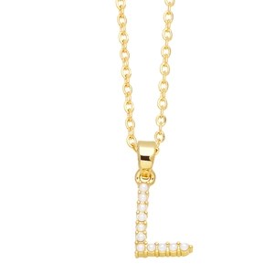 Detailed view of golden initial L pendant necklace set with elegant white pearls