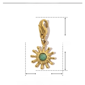 Detailed view of solar-shaped gold pendant with dimensions of 23mm by 10mm