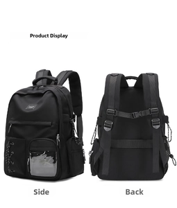 Detail view of black nylon backpack showing ergonomic back padding and breathable straps