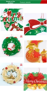 Close-up of Merry Christmas wreath featuring golden glitters and festive bow details