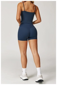 Vue arrière du short de yoga bleu marine à taille haute et haut court avec texture sans couture