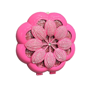 Sparkly pink flower handbag with silver rhinestones and glitter in a 3D floral design