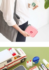 Detailed view of pink heart medical pouch with durable zipper and interior mesh storage