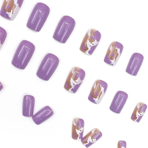 Square lavender purple and marble cow print press-on nails with a glossy finish