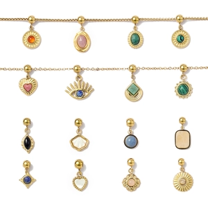 Collection of heart and evil eye pendants in natural stones with gold stainless steel