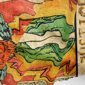 Detail of tarot style justice tapestry showing woven fabric texture and print quality