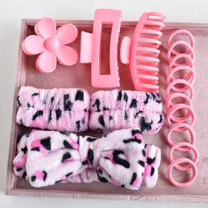 Pink hair accessory gift set including matte claw clips and plush leopard headbands