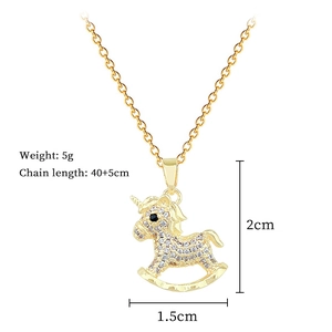 Detail view of gold rocking horse pendant with sparkling zircon and sizing dimensions