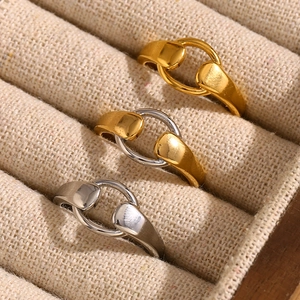 Polished 18K gold and silver plated stainless steel interlocking horsebit rings set