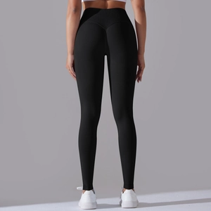 Close-up of high-waist yoga leggings with V-shaped seam detail for butt-lifting effect