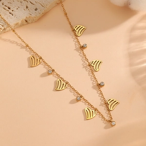 18K gold plated stainless steel necklace featuring hollow heart charms and zircons