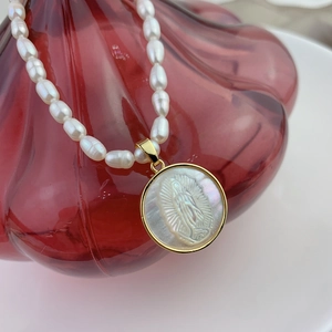 Freshwater pearl necklace with Mother of Pearl Virgin Mary Guadalupe pendant in gold frame