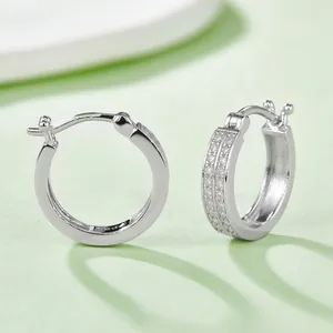 S925 sterling silver huggie earrings featuring double row pavé white cubic zirconia stones