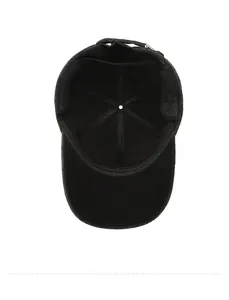 Detail of warm black baseball cap interior showing fleece lining and ear flaps