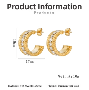 Detail view of gold-plated twisted C-hoop earrings with cubic zirconia and 18mm size specs