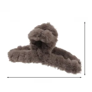 Detailed view of large brown plush hair claw clip with size dimensions 14cm and 7cm