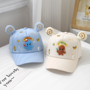 Detail of baby baseball caps with 3D cute octopus embroidery and marine life patterns
