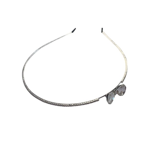 Elegant silver metal headband with sparkling crystals and a large rhinestone bow decoration