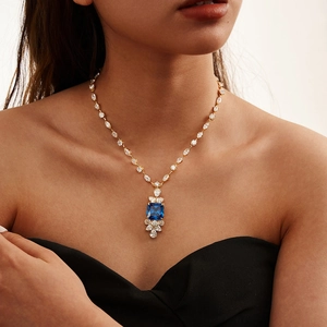 Elegant S925 sterling silver necklace with luxury blue square zircon on a model