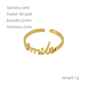 Detailed view of gold stainless steel ring with Smile engraving and 22mm width specs