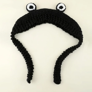 Cute black crochet frog eye headband with thick knit yarn for warm winter accessory