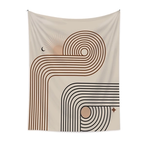 Detailed view of bohemian wall tapestry featuring geometric sun, moon, and star patterns