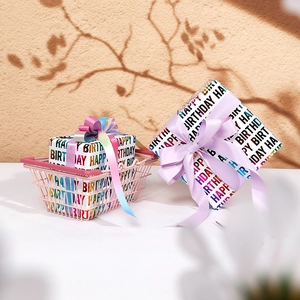 Colorful Happy Birthday gift wrapping paper set with elegant purple ribbon and gift boxes