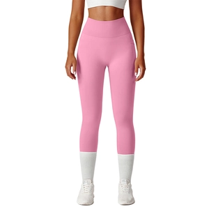 High-waisted macaron pink yoga pants with side pockets for running and fitness