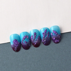 Detail of 5D lavender flower embossed nail stickers with blue-purple gradient finish