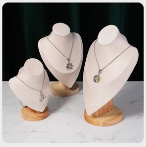 Three-piece velvet jewelry neck stands with beech wood base for necklace display