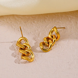 Minimalist 18K gold plated stainless steel Cuban chain link earrings on a beige surface