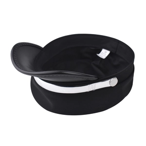 Detailed close-up of black newsboy cap with silver W-logo and leather brim