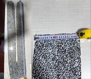Detailed measurement of leopard print tights showing 95cm length and 20cm width