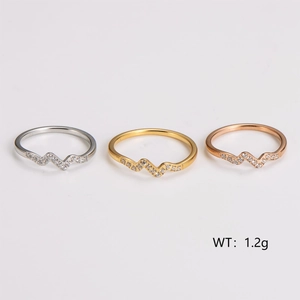 Set of wavy stainless steel rings with mini diamonds in silver gold and rose gold finishes