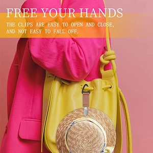 Detail of travel hat clip securing a straw hat to a yellow bag for hands-free use