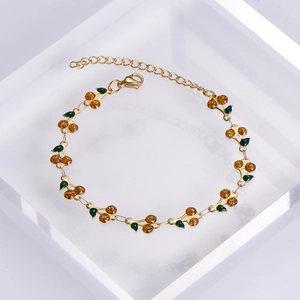 Elegant 18K gold plated cherry charm bracelet with glitter cherry pendants and green leaves