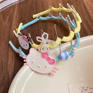 Cute cat-themed wavy fabric headbands for girls with Hello Kitty style bow accents