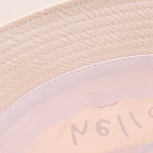 Detail shot of cotton sun hat showing high-quality stitching and breathable inner lining