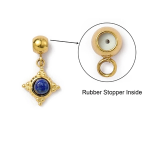 Detail of gold pendant with blue lapis lazuli and built-in rubber stopper for jewelry