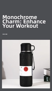 Macro detail of matte black 316 stainless steel bottle with texture and carry strap