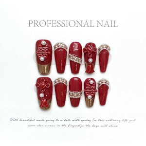 Exquisite 3D red bridal press-on nails with Xi character, pearls, and golden edges