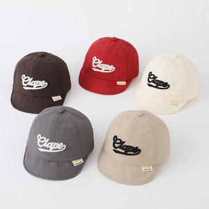 Detail view of quick-dry toddler baseball caps in five colors with Clape letter embroidery